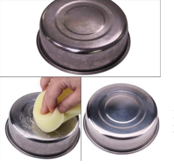 Multi-Surface Cleaning Paste being used with its built-in sponge to clean grime from a metal pot