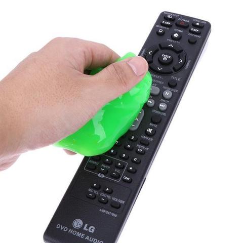 Magic Cleaning Gel cleaning a TV remote control