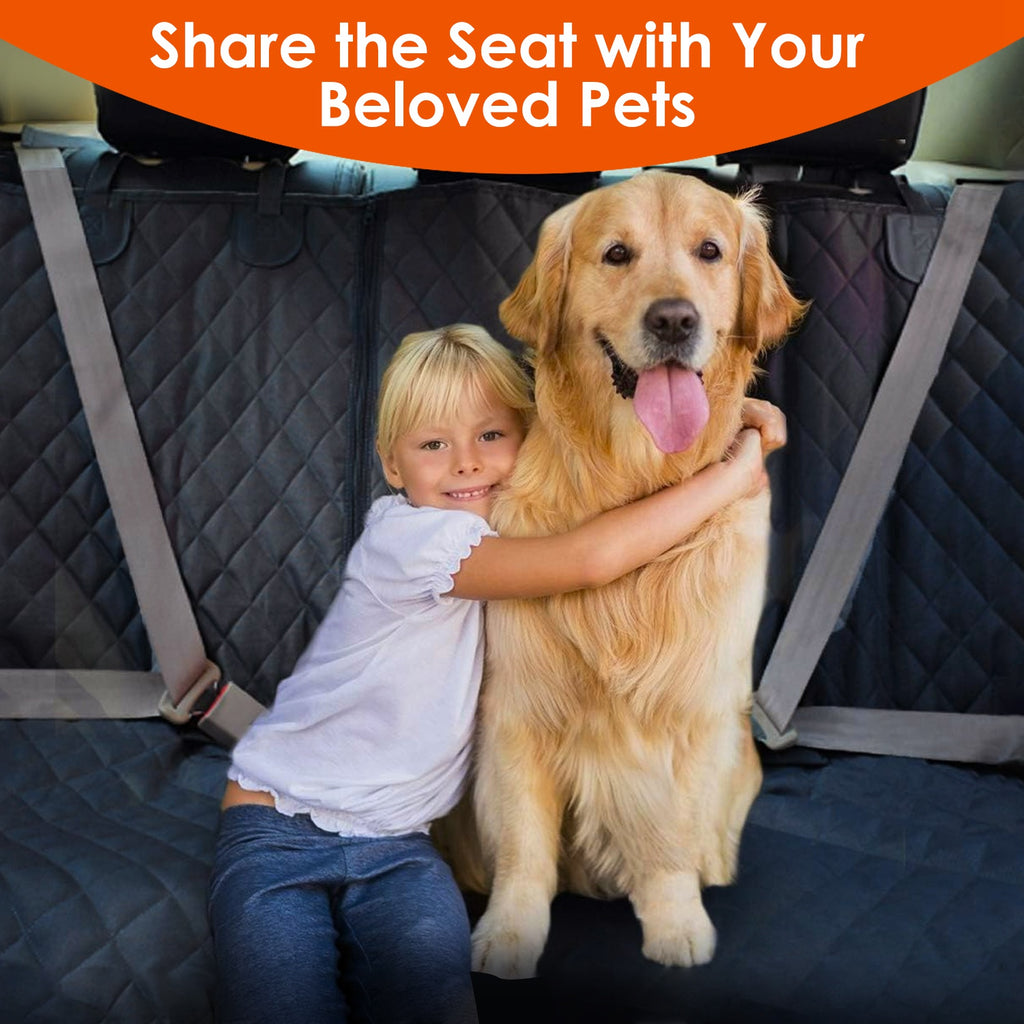 Dog and owner sitting on the RideAlong Car Seat Cover in a car boot