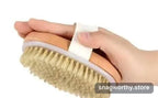 Wild Bristle Dry Body Brush held in hand | Snagworthy.store
