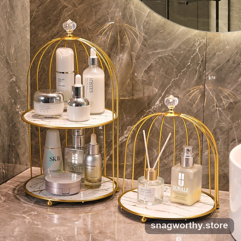 Gold wire domed bathroom countertop organizer holding skincare bottles | Snagworthy.store