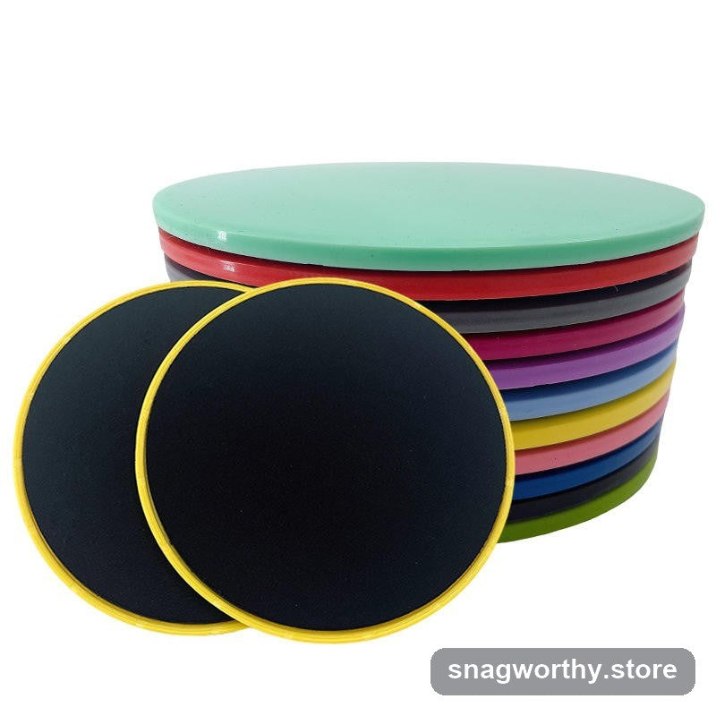 Pair of black core slider discs in front of a stack of colour options | Snagworthy.store