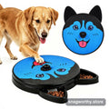Dog using a round scratch board with treat compartments to file its nails | Snagworthy.store