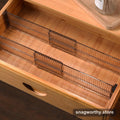 Adjustable spring-loaded drawer divider fitted in a drawer | Snagworthy.store