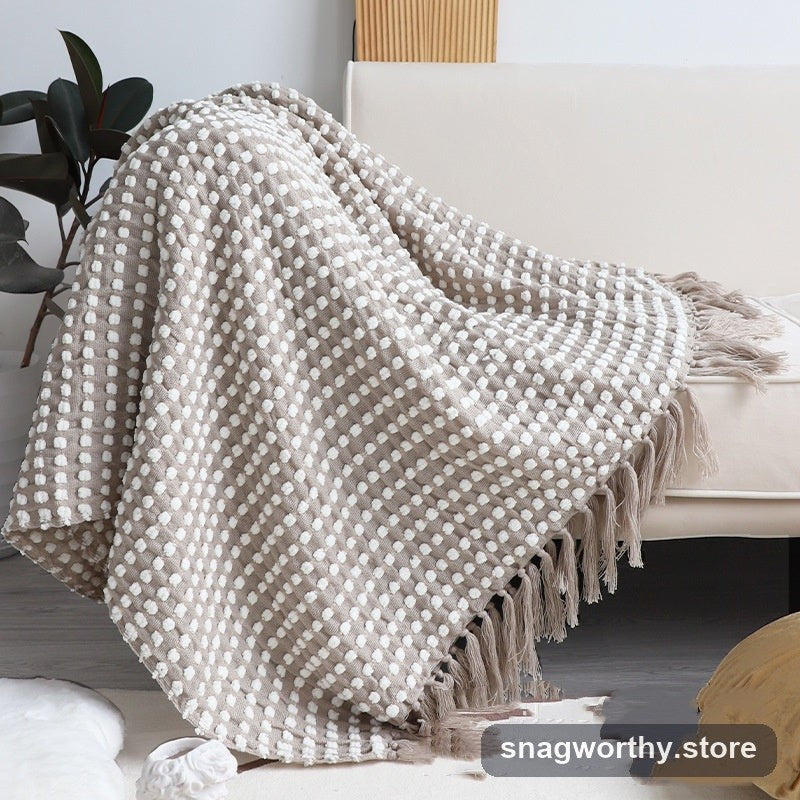Chunky knit throw draped on sofa | Snagworthy.store