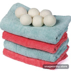 Wool dryer balls in dryer with laundry | Snagworthy.store