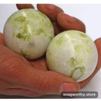 JadeFlow Kneading Balls resting in open palm | Snagworthy.store