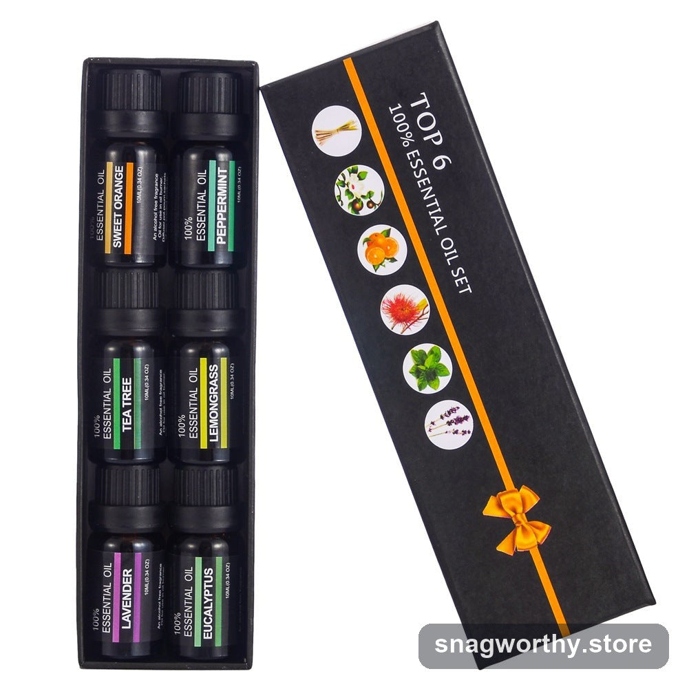 PureMist essential oil set bottles laid out next to gift box | Snagworthy.store