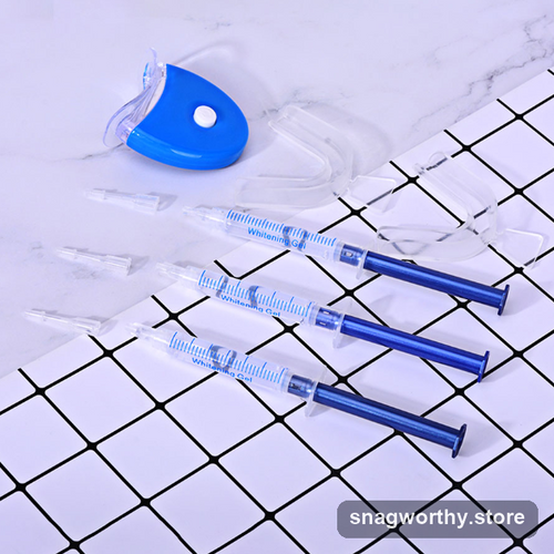 LED teeth whitening kit with gel syringes and mouth tray