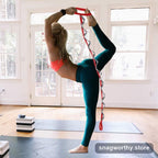 FlexReach Strap multi-loop stretch strap in use, red colourway